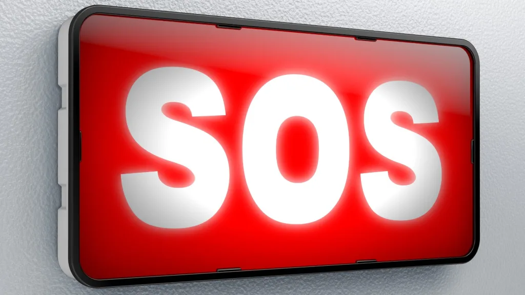 赤い画面に「SOS」と白く光る文字が表示された電子デバイス